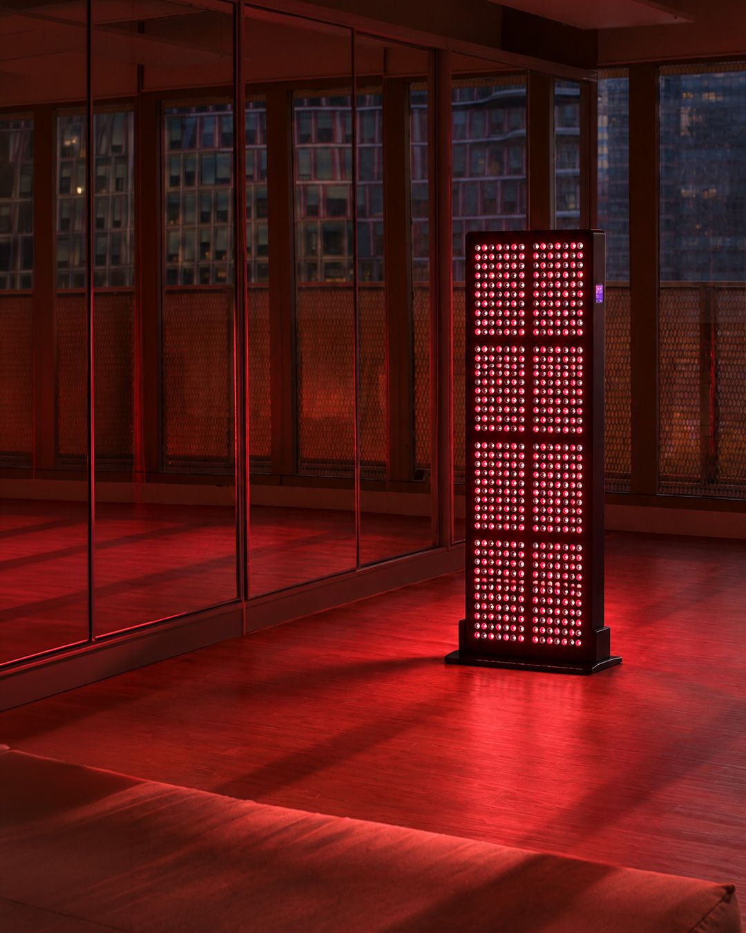 Medium-Body panel glowing in a mirrored studio at dusk